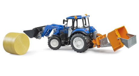 Blue farm toy tractor with front loader bucket, orange dump box and round bale