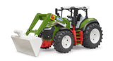 Bruder Roadmax tractor with green body, white roof, white front loader bucket, black frame and large tread tyres on a white background.