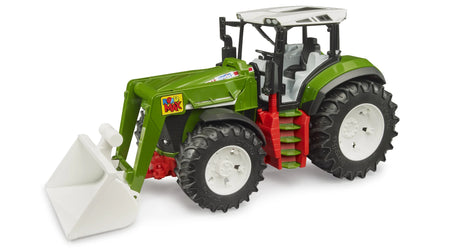 Bruder Roadmax tractor with green body, open cab seating, white front loader bucket and black wheels with white rims on a white background.