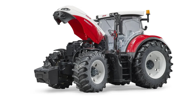 Bruder Steyr 6300 Terrus CVT tractor with bonnet raised showing engine area, cab doors and front axle