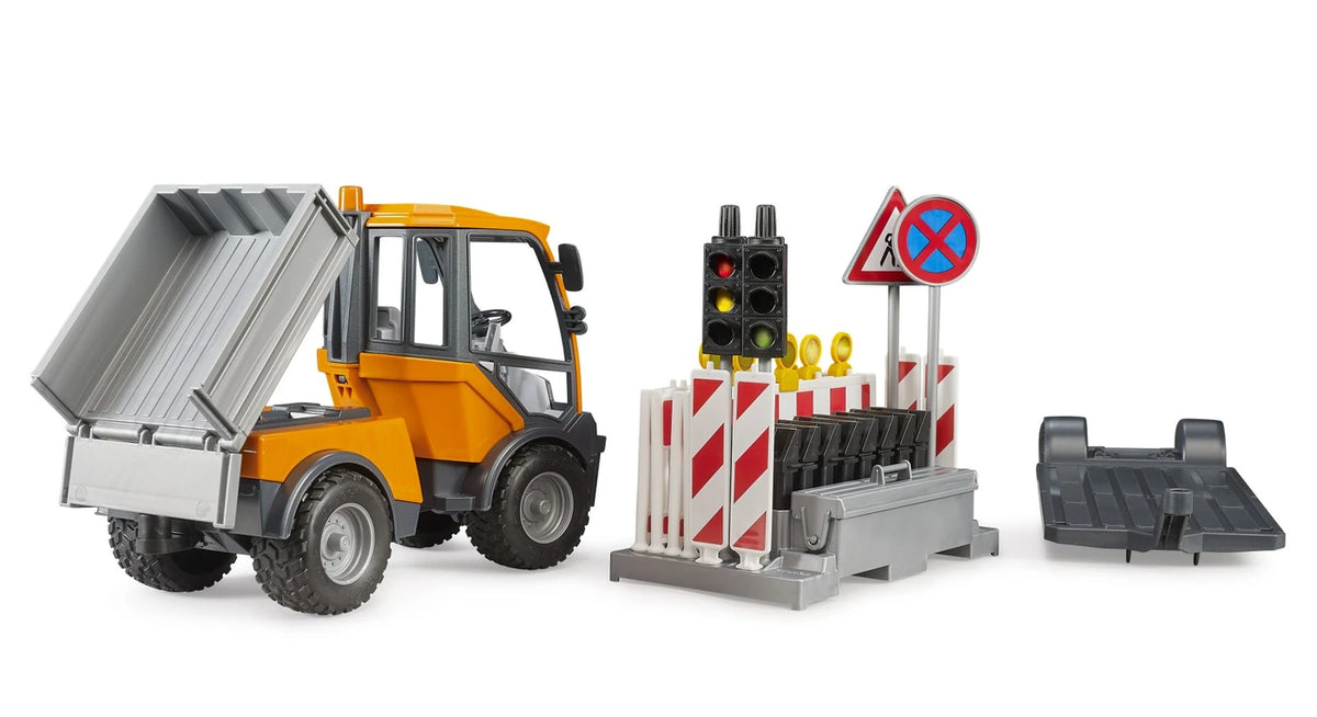 Bruder 1:16 VarioCar 02693 rear view with tipping body raised beside the removable road safety equipment and trailer platform