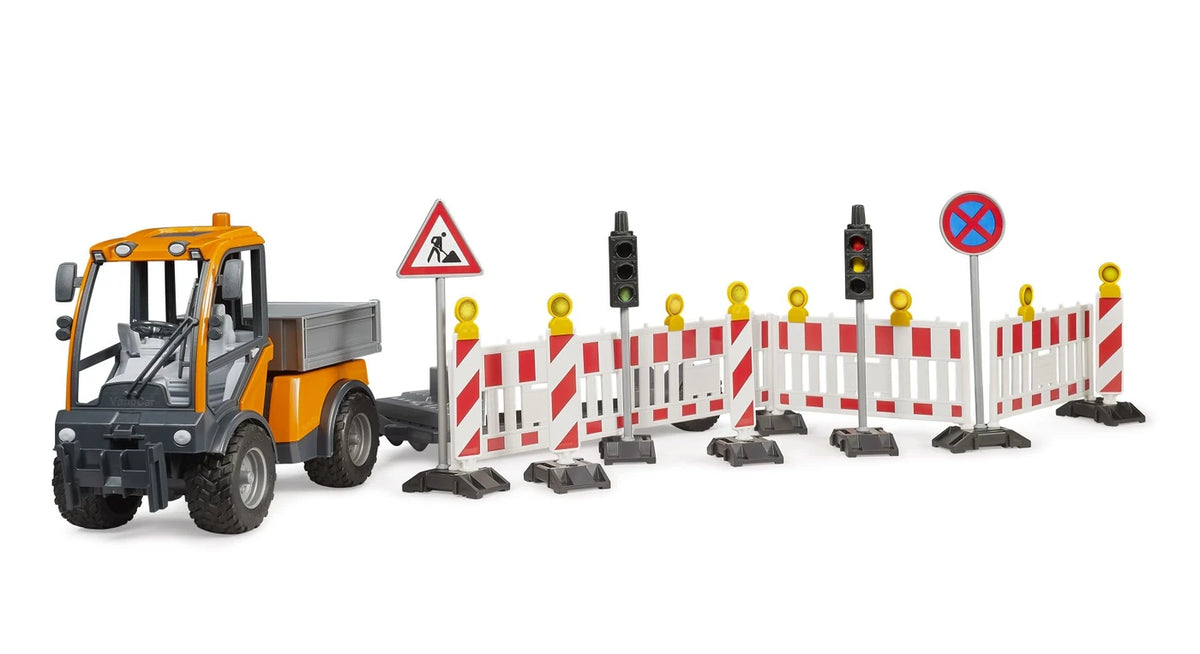 Bruder 1:16 VarioCar 02693 beside a roadworks layout with barrier fences, traffic lights, warning posts and road signs