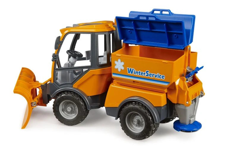 Bruder VarioCar Winter Service 02690 with blue hopper lid raised, showing the empty orange grit container and rear spreading mechanism.