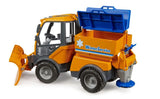 Bruder VarioCar Winter Service 02690 with blue hopper lid raised, showing the empty orange grit container and rear spreading mechanism.