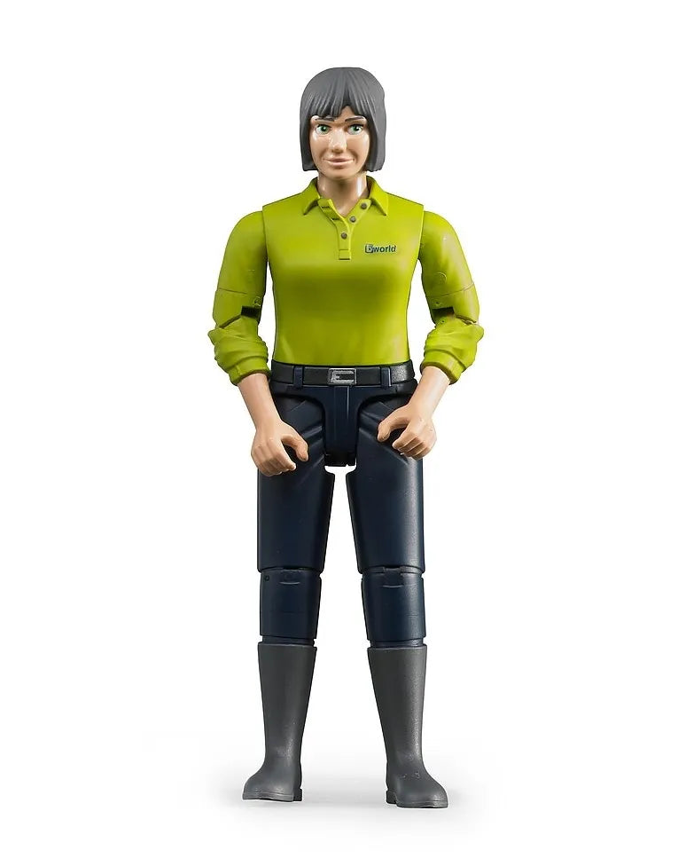 Bruder woman figure with light skin shown standing front facing with grey bob haircut, green long sleeve polo with bworld logo on chest, dark blue jeans, black belt and grey boots, hands held forward