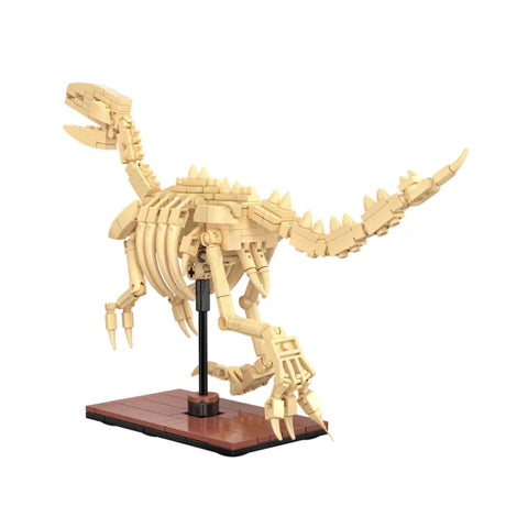 CaDA Velociraptor skeleton brick model on brown base stand with rib cage, claws and long curved tail