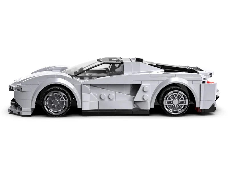 Side view of CaDA Lotus Evija construction car showing silver aerodynamic body, wheels and low-profile design