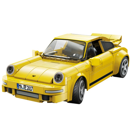 Front angled view of the CaDA RUF CTR 2017 Yellowbird model in bright yellow showing headlights and bonnet shape