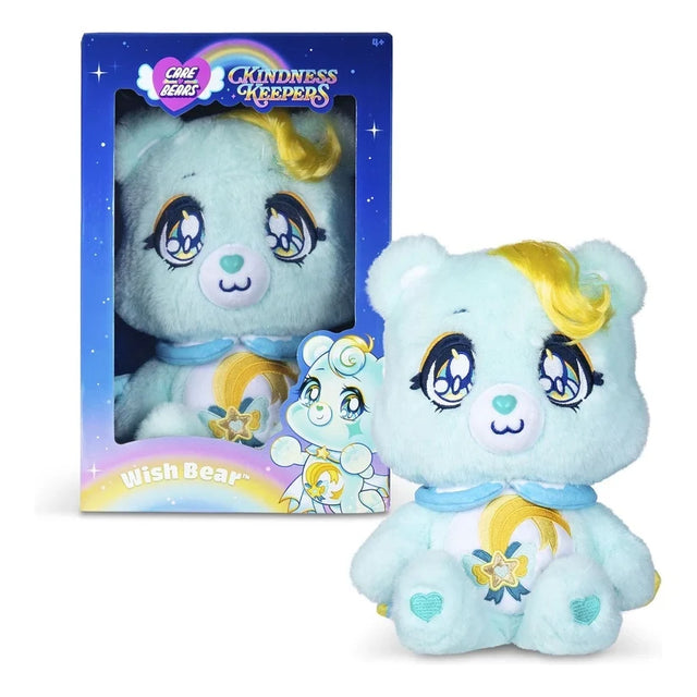 Care Bears Kindness Keepers Wish Bear plush displayed beside its blue collector box, showing the turquoise bear with yellow hair curl, star belly badge and matching packaging artwork.