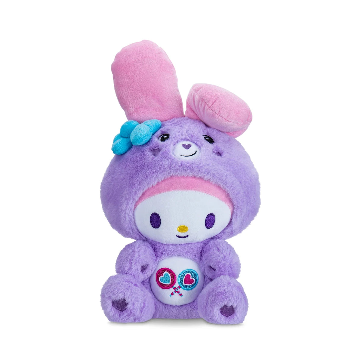 Front view of My Melody as Share Bear plush showing its white face, purple eyes, yellow nose, pink rabbit ears, turquoise bow and two heart lollipops on its belly.