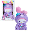 My Melody as Share Bear purple plush displayed beside its Hello Kitty and Friends x Care Bears retail box, showing the packaged and unpackaged toy together.