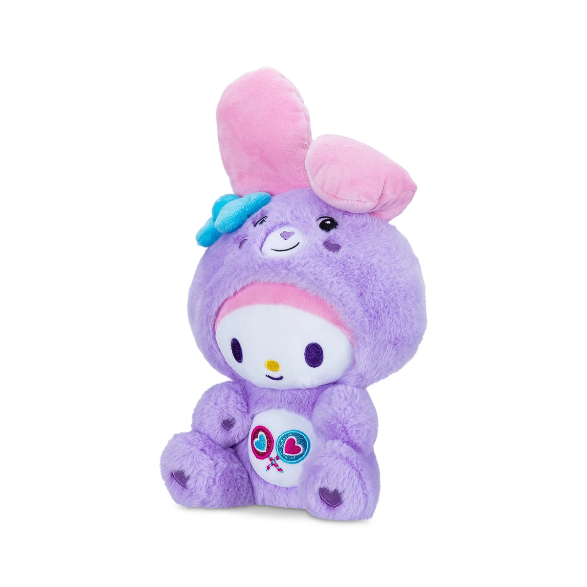 Three quarter view of the seated My Melody as Share Bear plush showing its purple fur, raised pink rabbit ear, turquoise bow and embroidered belly badge.