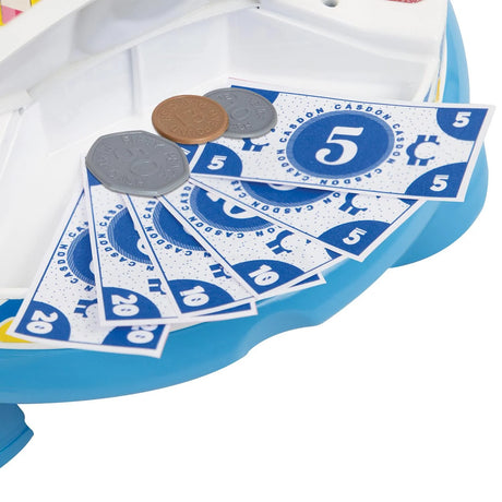 Casdon toy play money notes and coins spread near candy station – Ireland
