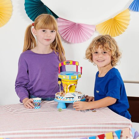 Two children playing with Casdon Candy Store on a table – Ireland