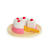 Casdon toy cake with slice separator on plate – Ireland