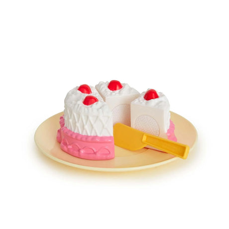 Casdon toy cake with slice separator on plate – Ireland