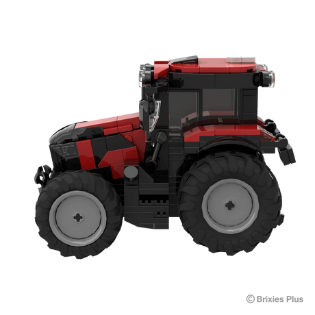 Side view of the BRIXIES Plus Case Puma 175 showing the red bodywork, enclosed cab, exhaust stack and different sized agricultural tyres