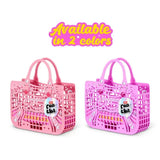 Two Cha Cha Cha moulded purses in light pink and bright pink with top handles, lattice fronts and hanging tags.