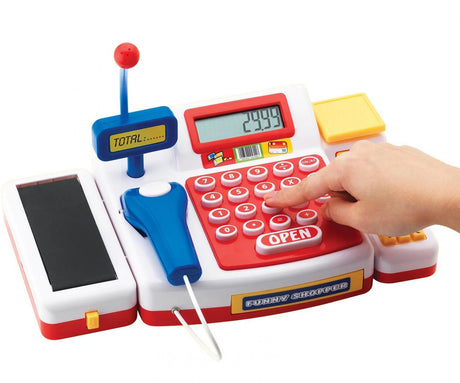 Close-up of checkout counter toy keypad and open drawer – Ireland