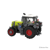 BRIXIES Plus CLAAS AXION 9450 tractor viewed from the left rear showing the green bonnet, enclosed cab, large rear wheel and rear linkage