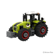 CLAAS AXION 960 BRIXIES tractor viewed from the front left showing the grey front weight, green bonnet, cab and red rimmed wheels