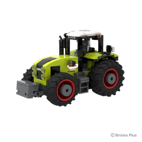 CLAAS AXION 960 BRIXIES tractor viewed from the front left showing the grey front weight, green bonnet, cab and red rimmed wheels