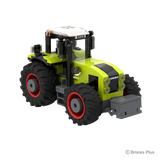 Front three quarter view of the BRIXIES Plus CLAAS AXION 960 showing the headlights, front weight, bonnet, cab and agricultural tyres