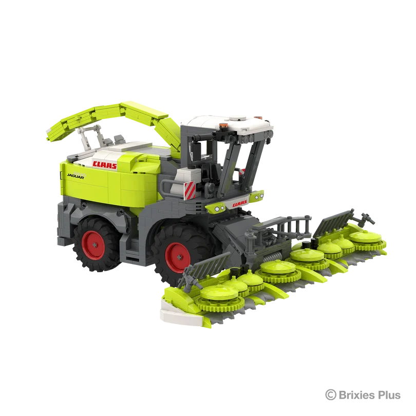 Front angled view of the BRIXIES Plus CLAAS JAGUAR 1200 showing the wide maize header with multiple intake units, cab and large front wheels
