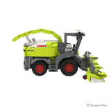 BRIXIES Plus CLAAS JAGUAR 1200 forage harvester in left side profile showing the maize header, discharge spout, cab and red rimmed wheels