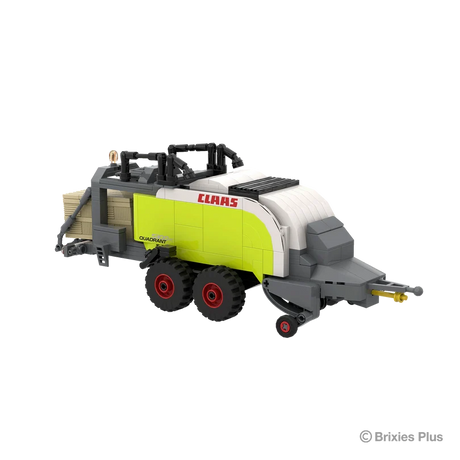 BRIXIES Plus CLAAS QUADRANT 5300 FC square baler viewed from the front left showing the drawbar, pickup section, twin wheels and lime green side panels