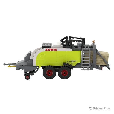 Side profile of the BRIXIES Plus CLAAS QUADRANT 5300 FC showing the side ladder, lime green baler body, twin red rimmed wheels and drawbar