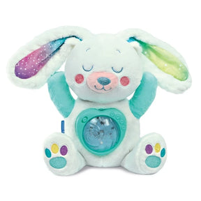 Baby Clementoni Arctic Bunny white plush toy with closed embroidered eyes, rainbow coloured ears, turquoise paws and circular light projector on its tummy.