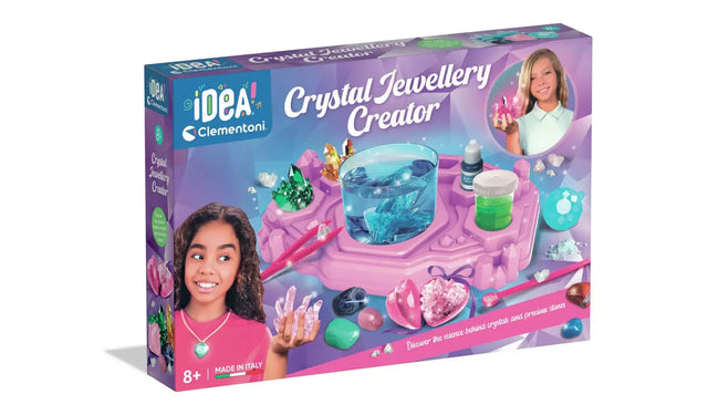 Clementoni Idea Crystal Jewellery Creator retail box showing a purple crystal workstation, blue crystal growing cup, gemstone jewellery, two children and 8+ age marking.
