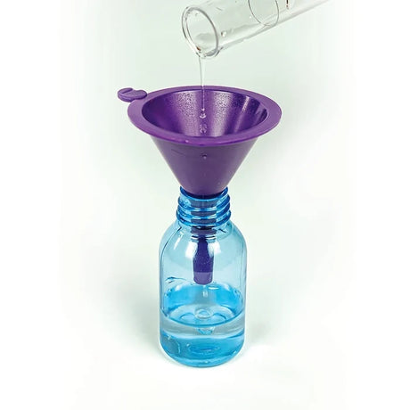 Clear liquid being poured through a purple funnel into a blue bottle.
