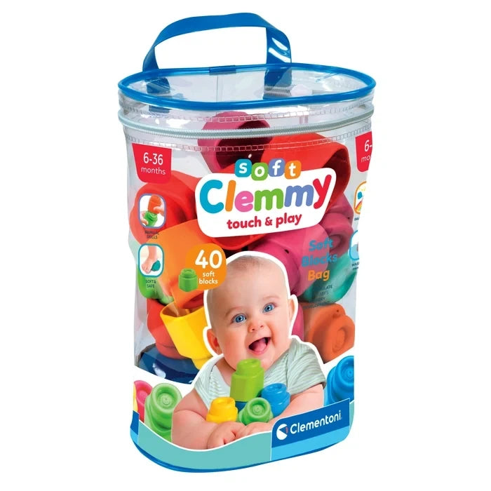 Clementoni Soft Clemmy Touch & Play transparent storage bag with blue carrying handle, colourful soft building blocks, baby photograph and 40 soft blocks branding.