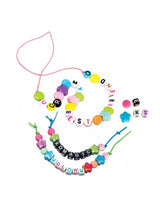 Colourful friendship bracelets made with pastel beads, flower shaped beads, smiley face beads and alphabet beads spelling messages, displayed with pink and green cords on a white background.