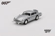 Mini GT James Bond Goldfinger Aston Martin DB5 silver RHD model viewed from the front left showing the chrome grille, front bumper details and wire style wheels