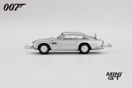 Silver Aston Martin DB5 from Goldfinger shown in full side profile with chrome trim, wire style wheels and extended bumper details