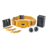 DC Batman Utility Belt laid out with batarangs, smoke pellets, and detachable gadget holders