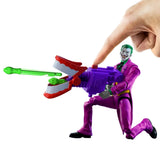 DC Premier The Joker kneeling with purple blaster as top button is pressed