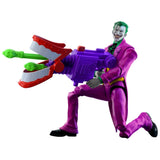 DC Premier The Joker firing two green projectiles from purple blaster