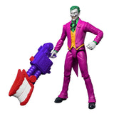 DC Premier The Joker standing beside large purple and red blaster