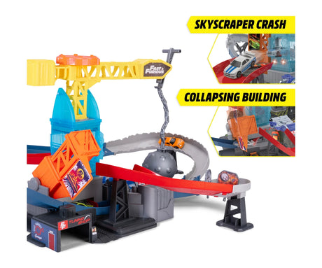 Fast & Furious Wrecking Crash Course track showing the crane, hanging wrecking ball and collapsing orange building, with closeup images of the skyscraper crash and collapsing building.