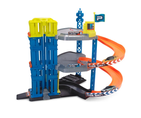 Dickie Parking Station Garage Playset with blue and yellow lift tower, grey parking levels, two orange spiral ramps and two cars on a white background.