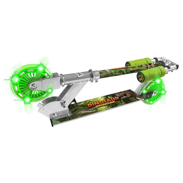 Folded dinosaur themed scooter showing the green light up wheels, chrome frame, and printed deck.