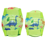 Dinosaur themed knee and elbow pads front view showing green fabric, clear protective shells, and printed dinosaur designs