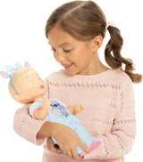 Child cradling the Disney Darlings Stitch Blonde Doll with the doll's eyes closed