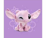 Cute Disney Doorables Angel plush toy from Lilo and Stitch sitting in a playful pose with bright expressive eyes.