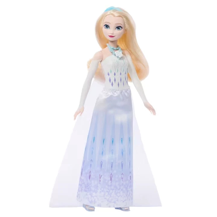 Disney Frozen Jewel Reveal Elsa doll wearing a white and pale blue Snow Queen dress and cape