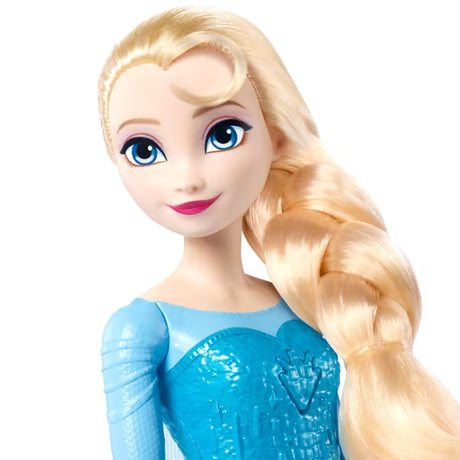 Close view of the Disney Frozen Light-Up Singing Elsa Doll with blue eyes, a blonde braid and blue bodice.